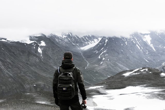 man-standing-at-mountian